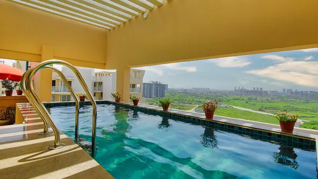 Experion Heartsong - rooftop pool with city view (photo) thumbnail