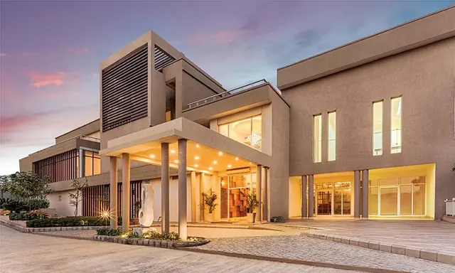 Experion Heartsong - clubhouse exterior at dusk (photo) thumbnail