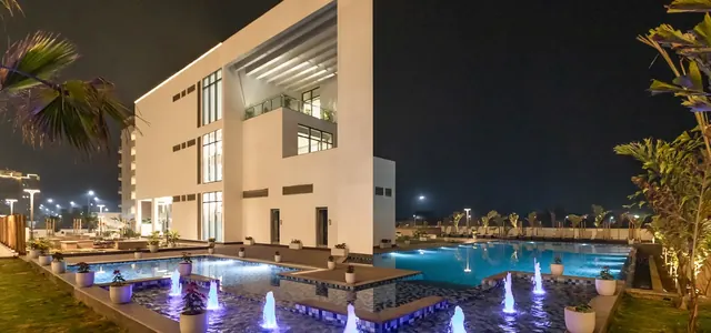 Godrej 101 - clubhouse and pool at night thumbnail
