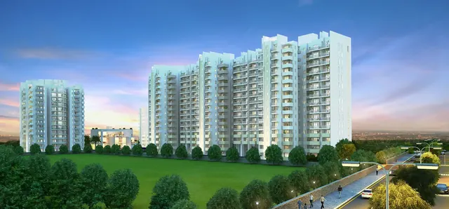 Godrej Aria - tower exterior at dusk thumbnail