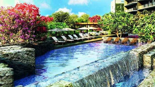 Krisumi Waterfall Suites - main garden with waterfall pool thumbnail