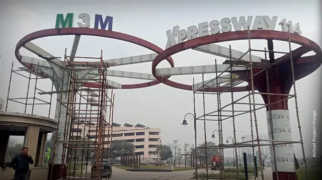 M3M Xpressway 114 - Actual image of the entrance gate under construction thumbnail