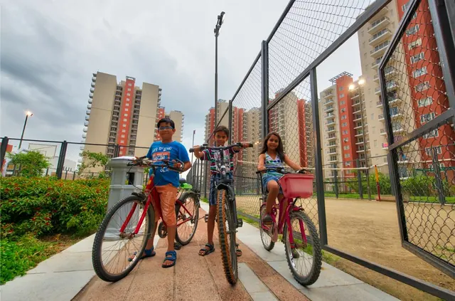Mahindra Aura - cycling track with kids (real photo) thumbnail