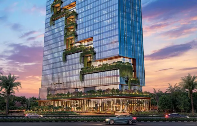 Puri Aerosphere - Tower with landscaped sky terraces at dusk thumbnail