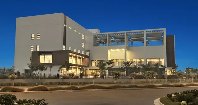 Sobha International City - clubhouse exterior at dusk thumbnail