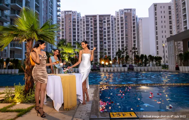 Tata La Vida - swimming pool at dusk (actual photo, with people) thumbnail